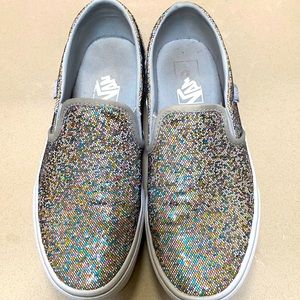 Vans slip on sneakers.